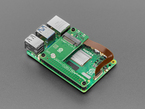 Angled Demo Shot (2) of the Raspberry Pi M.2 HAT+ Compact assembled to the Raspberry Pi 5.