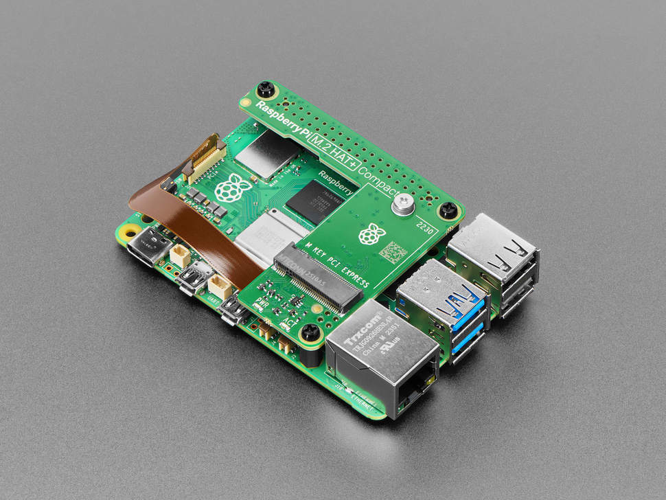 Angled Demo Shot (1) of the Raspberry Pi M.2 HAT+ Compact assembled to the Raspberry Pi 5.