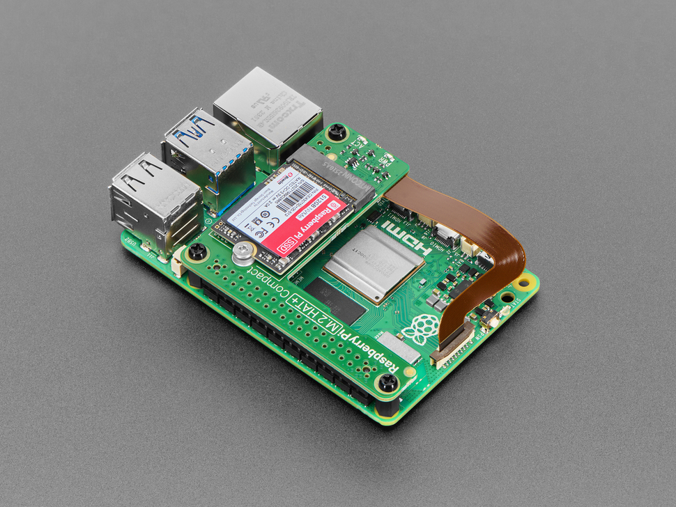Angled Demo Shot (3) of the Raspberry Pi SSD Connected to the  M.2 HAT+ Compact assembled to the Raspberry Pi 5.