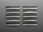 Top Down Shot of the NeoPixel Nano 2020 RGB LEDs - 100-pack enclosed in a protective casing in groups of 10.