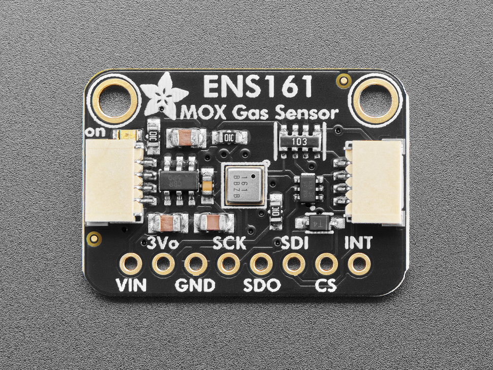 Overhead shot of black, rectangle-shaped MOX gas sensor breakout.