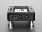 Side Profile Shot of the USB-C and Select Buttons on the Adafruit MagTag Enclosure with MagTag and Magnetic Standoff Feet