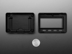 Top Down Interior Shot of the Adafruit MagTag Enclosure Kit next to a U.S. Quarter for Scale.