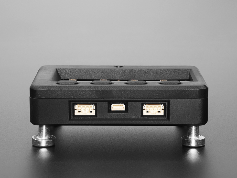 Side Profile Shot of the JSTs on the Adafruit MagTag Enclosure with MagTag and Magnetic Standoff Feet