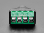Close-up of 4-pin terminal block on audio adapter.