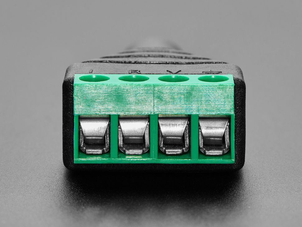 Close-up of 4-pin terminal block on audio adapter.