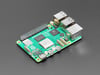 Green credit-card-sized microcontroller.