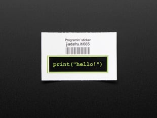 Rectangular sticker with green words "Print Hello" on black background with green edging. Mounted on white paper with barcode. 