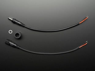 Top Down Kit Shot of the Waterproof DC Power Cable Set - 5.5/2.1mm. Two Separate Cables with Washer and Locking Nut.