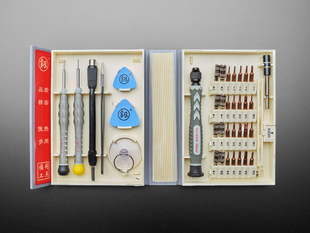 Top down of screwdriver kit with one handle and many tips