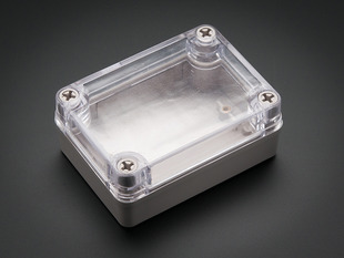 Small weatherproof enclosure with clear lid.